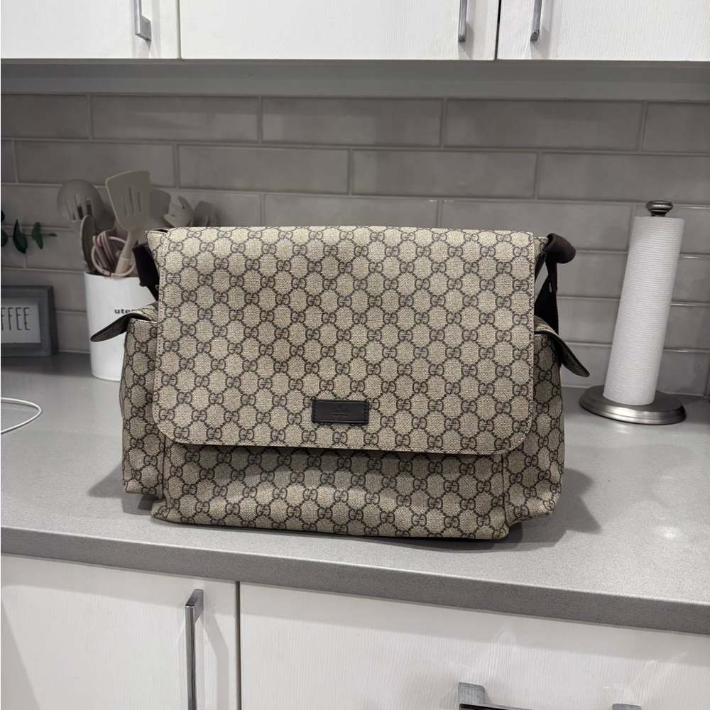 GG Supreme canvas diaper bag . Great  condition.